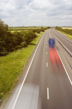Blurred traffic on a British motorway