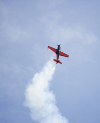 Stunt plane soaring into the sky.