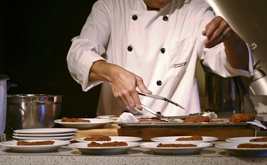 A chef preparing food. - 3944241