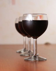 Three glasses of red wine