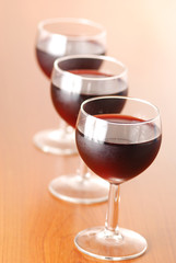 Three glasses of red wine