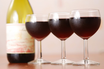Three glasses of red wine