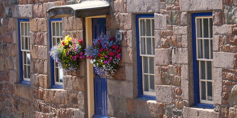 Granite Cottage with blooms
