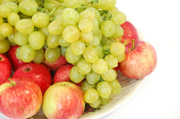 Grapes and apples close-up on white background  