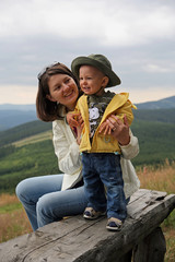 Mother and her baby hiking