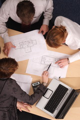 Architect, clients,blueprints