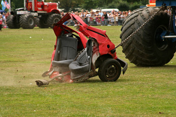car pulled apart by monster truck