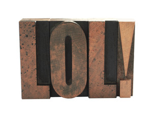 the term 'LOL in old letterpress wood letters