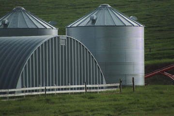 Steel buildings in farmyard