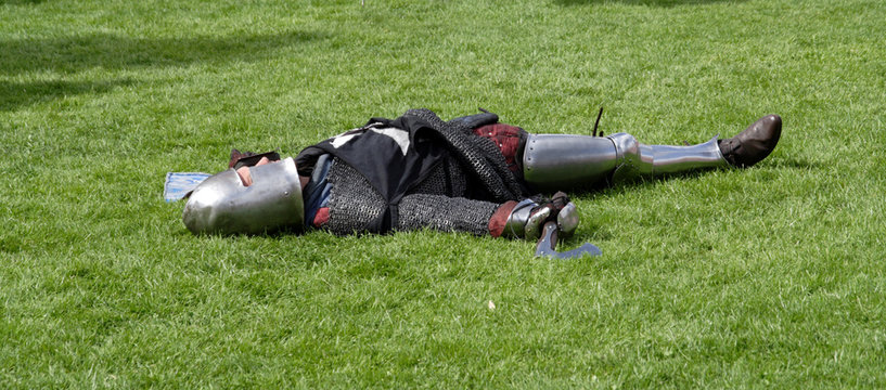 Knight playing dead after a mock battle