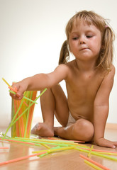 child with straws