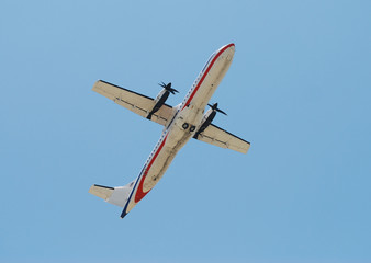 Turboprop airplane seen from below