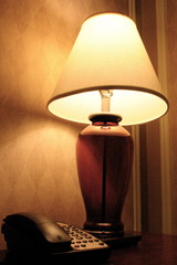 Bedside Table with Lamp and Telephone