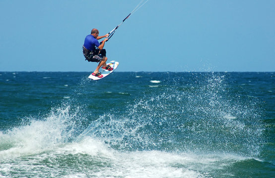 Photo of male kite boarder.