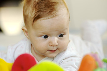 Amazing baby looking on the toy