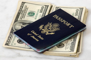 United States Passport on Stacks of One-hundred Dollar Bills