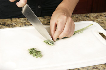 Cutting Sage in Kitchen