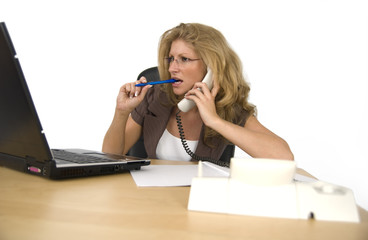 Business woman telephones.