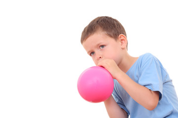 blowing up balloon