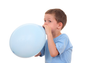 blowing up balloon