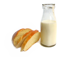 Old fashioned milk bottle with bread