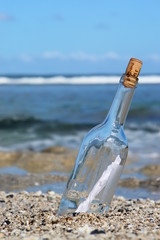 message in bottle on the beach