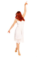 The girl in a white dress and with red hair