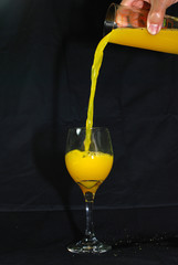 man pouring water into the cup