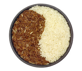 Bowl of brown and white rice forming a ying yang symbol