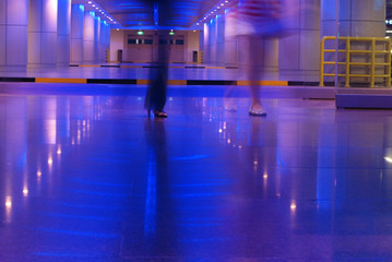People walking in the basement car park