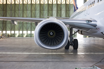 Jet engine at aircraft  in the hangar