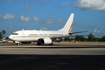 Boeing 737 passenger jet parked at terminal