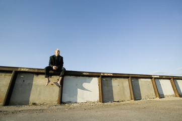 Punk Businessman on a Wall