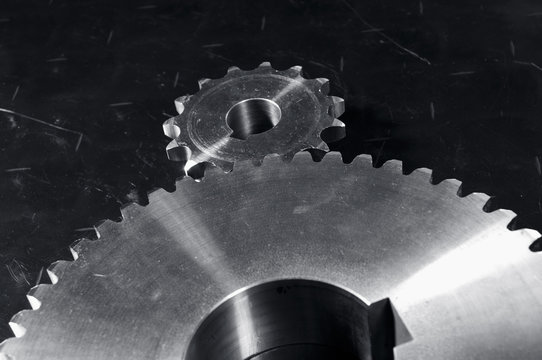 gears against dark steel