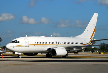 Modern passenger airplane awaiting flight on a runway