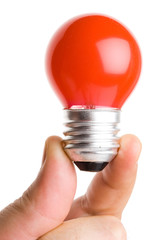  Hand holding a red light bulb