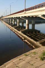 The bridge through the river Ozerna. Moscow region, Russia.