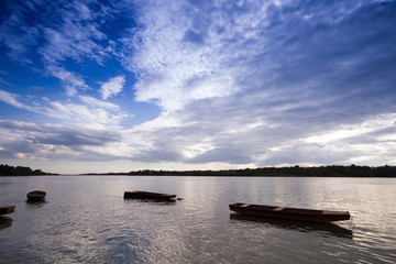 Fototapeta na wymiar Boats at sunset on the Danube river