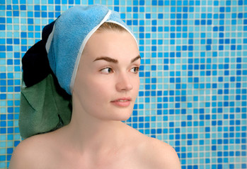 women in towel on head