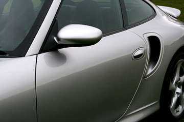 side of silver sportscar