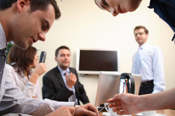 Brainstorming.Business people in action in office environment