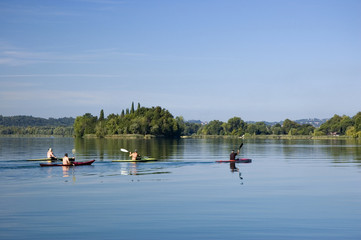 A group of canoes in the lake