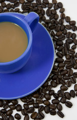 Coffee on coffee beans