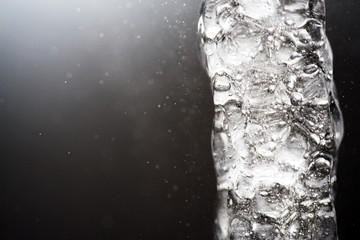 Water Jet frozen in silver background