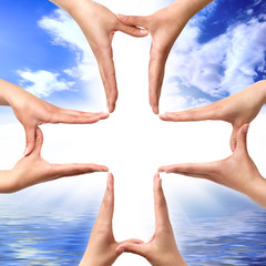 Cross Symbol Made From Hands