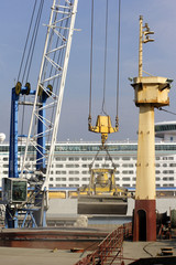 Naklejka premium freight ship being loaded with aggregate