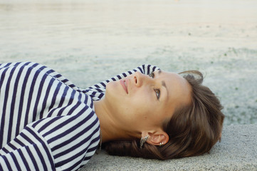 Girl resting in the striped vest