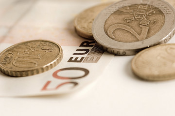 euro banknotes and coins