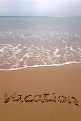 Vacation in sand vertical.