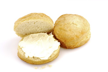Buttered biscuit isloated on white